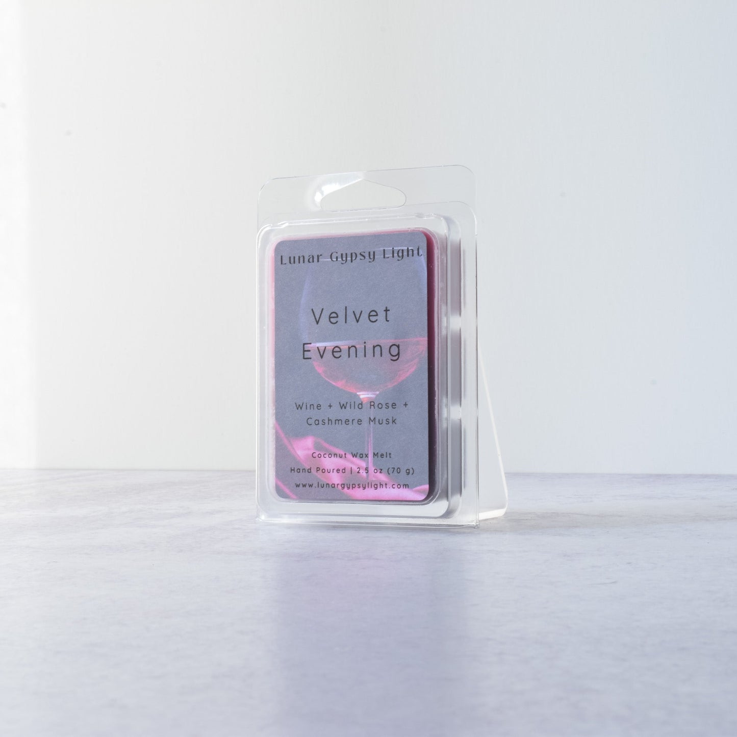 Scented wax melt package labeled 'Velvet Evening' on a white background