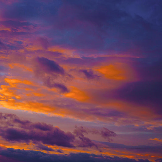 Twilight picture of clouds orange blue and purple
