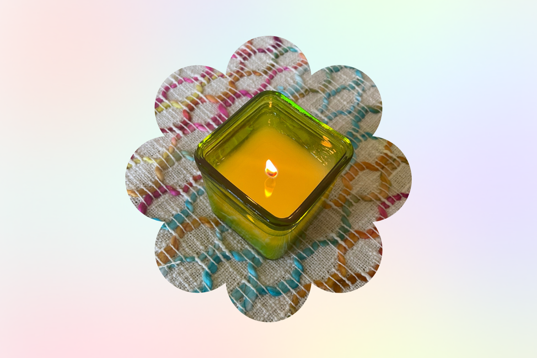 Hand poured limited edition spring candle in Mint and Grapefruit with clean white wax in minimalist glass vessel.