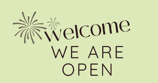 Welcome We Are Open image with green background and fireworks