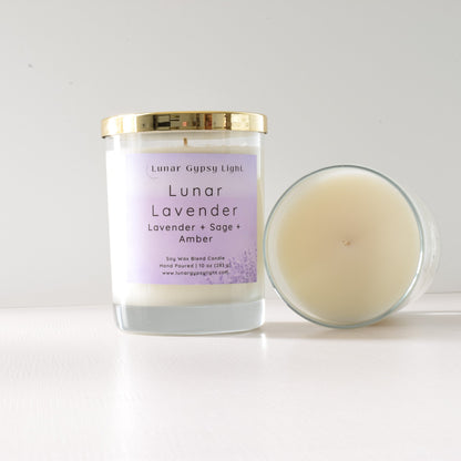 Candle with a label reading 'Lunar Lavender' on a white background