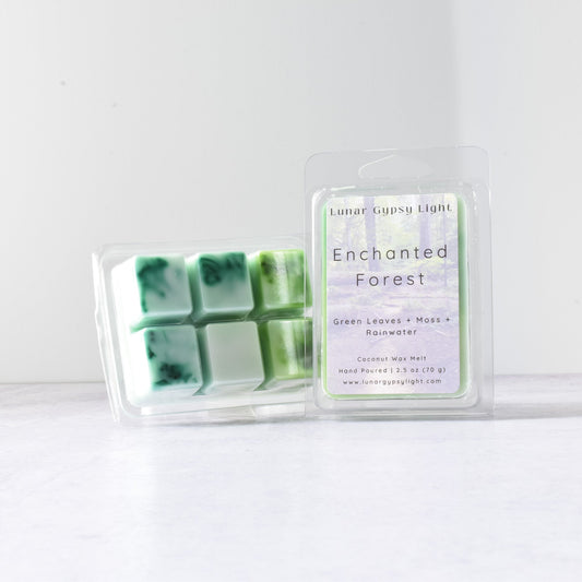 Packaged wax melts labeled 'Enchanted Forest' on a white background