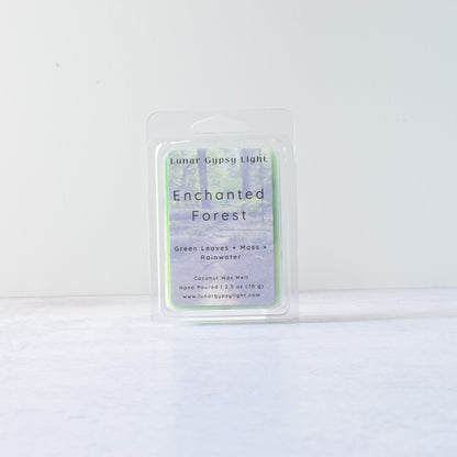 Wax melt packaging labeled 'Enchanted Forest' on a white background