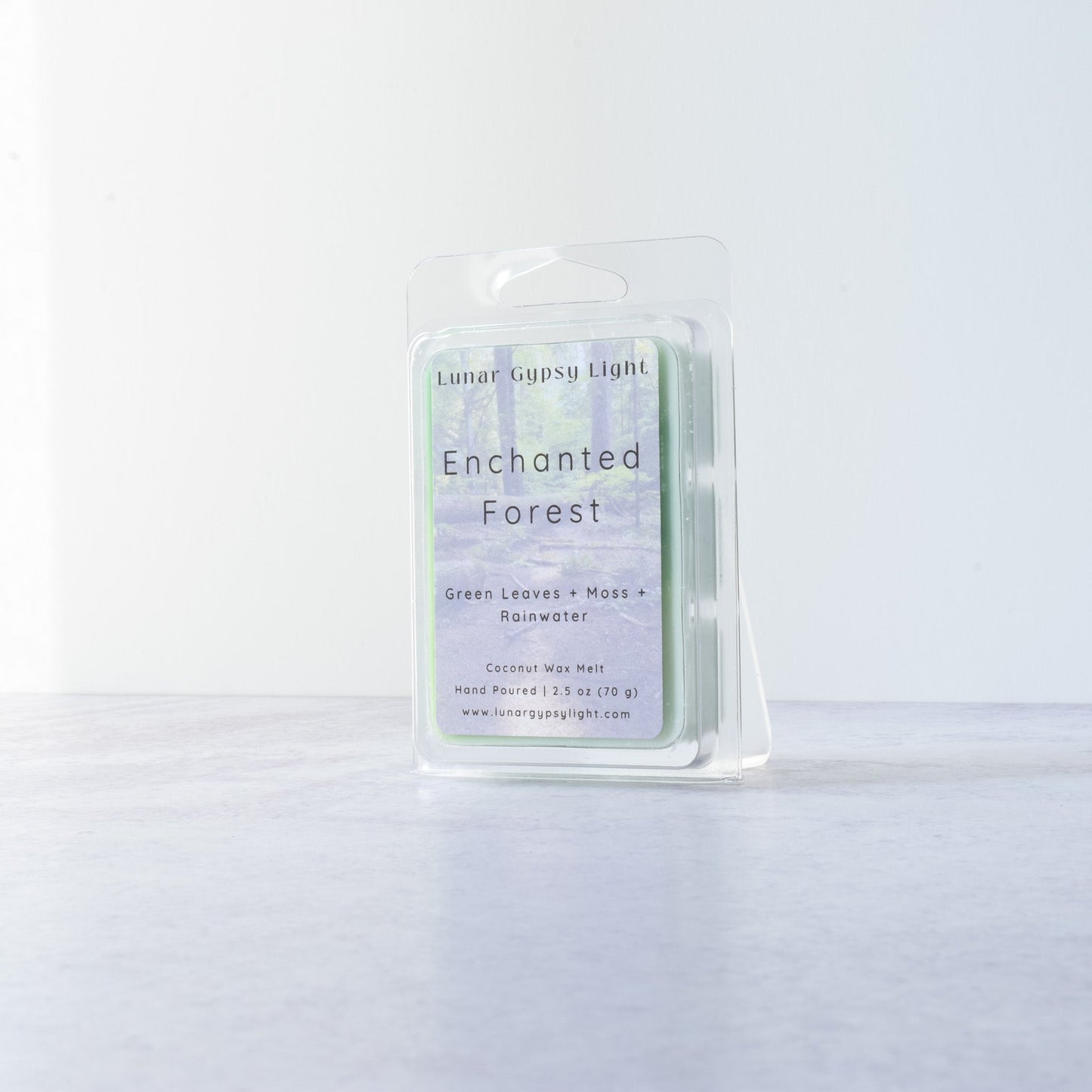 'Enchanted Forest' Labeled wax melts on a white background