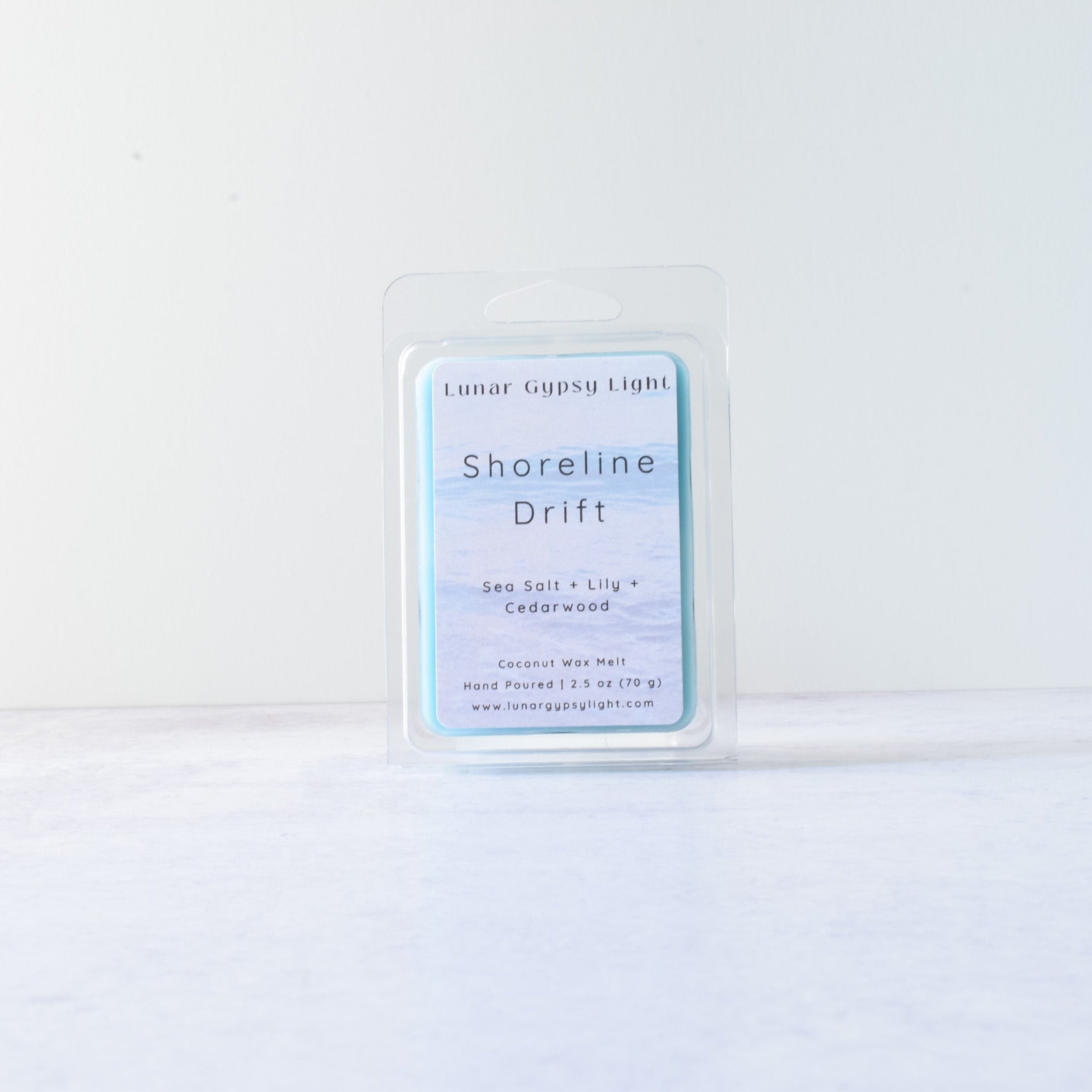 Product packaging labeled 'Shoreline Drift' Wax Melt on a white background