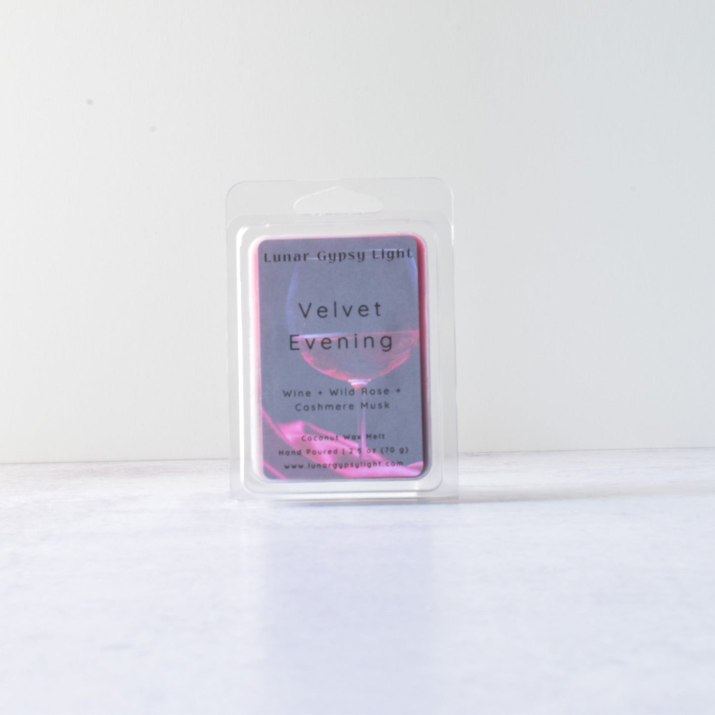 Wax Melt labeled  'Velvet Evening' on a white background