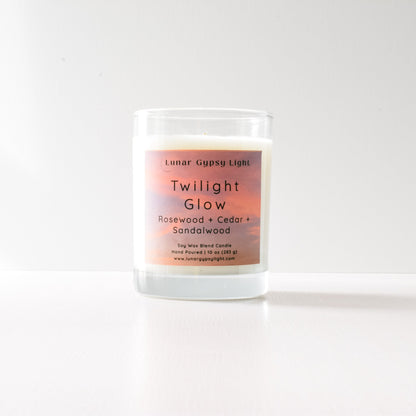 Candle labeled 'Twilight Glow' with a gradient label on a white background and gold lid
