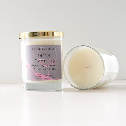 Candle with a label Velvet Evening  on a white background and gold lid